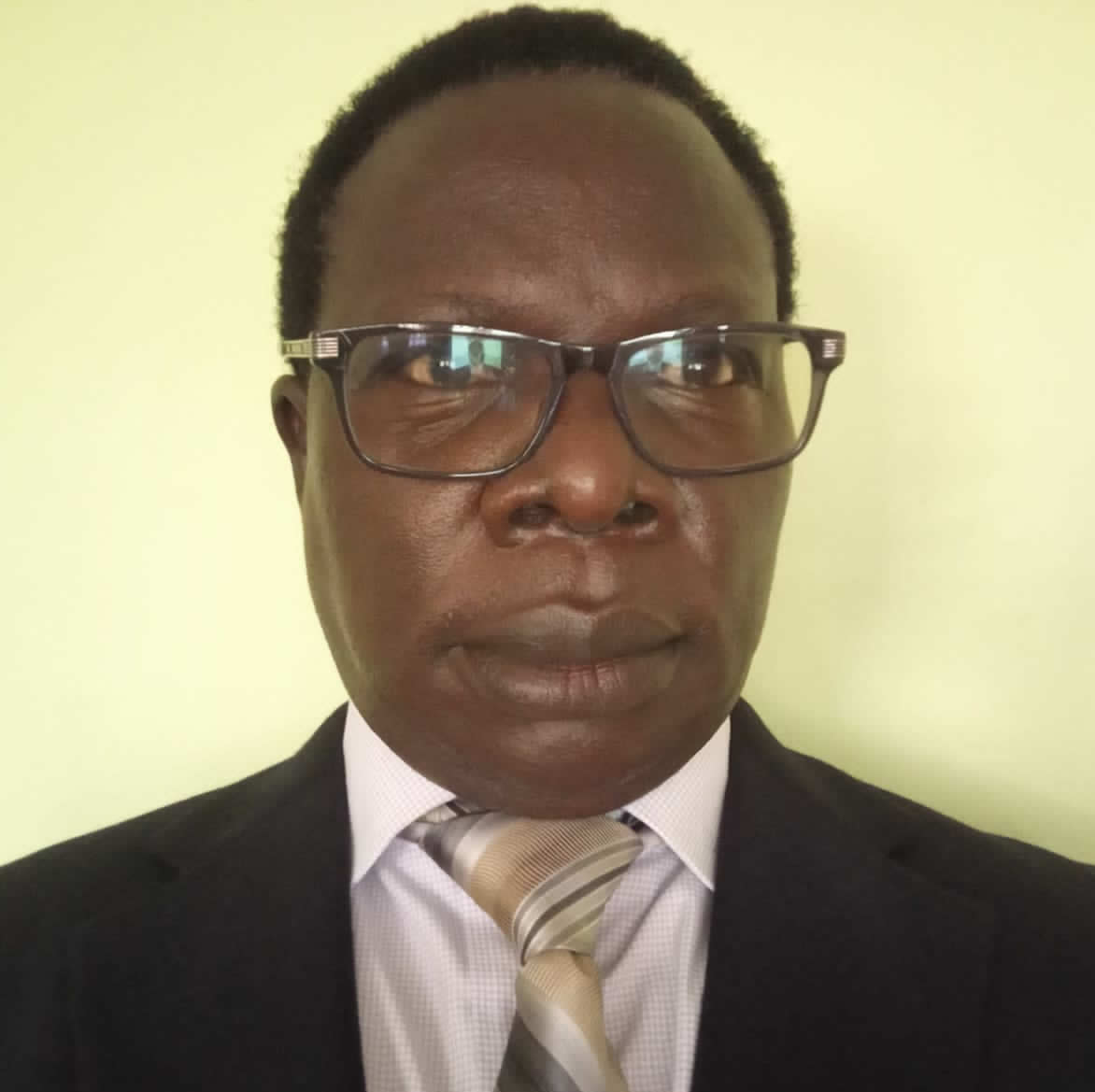 Dr. Charles Angira